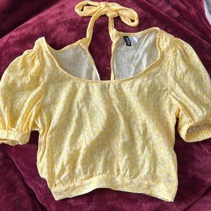 Size- XXS. Color Yellow with floral design